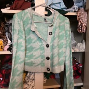 Ripped in the back can be sew back